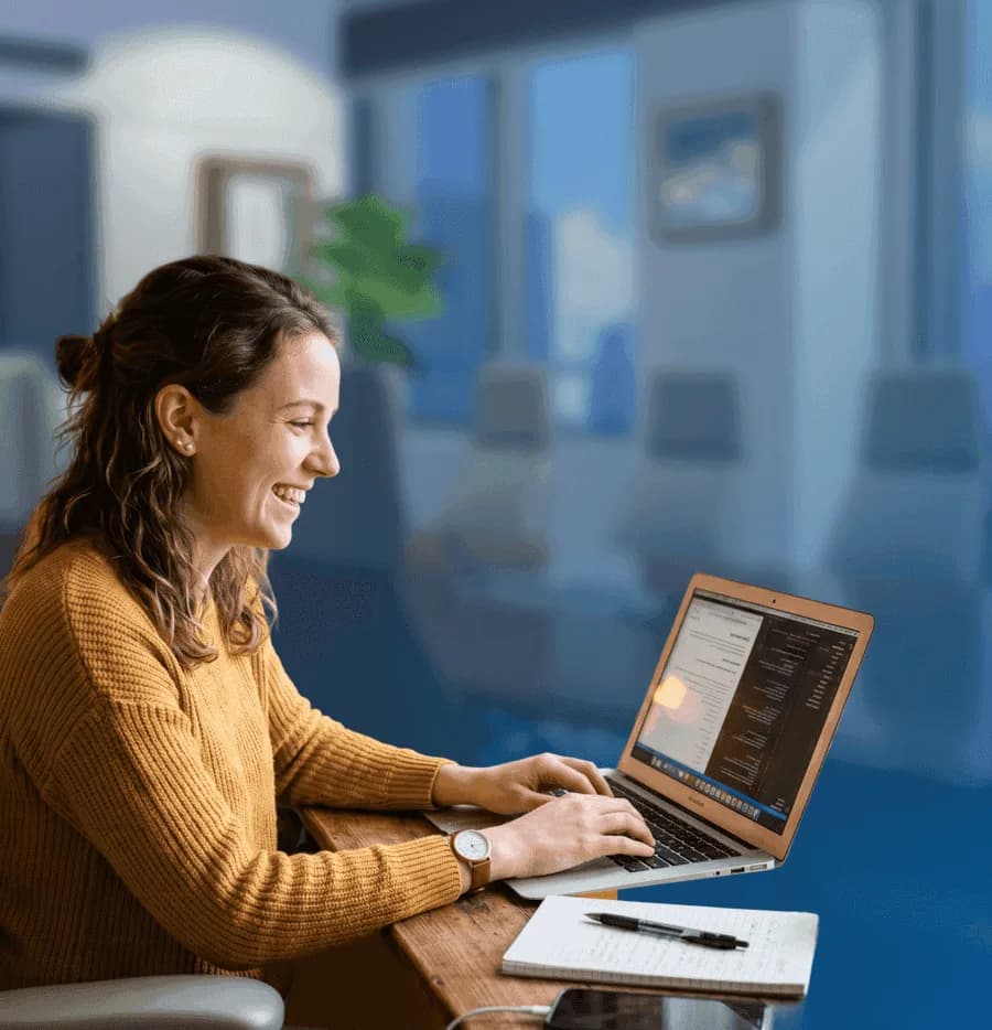 Female trainer preparing a scenario on her laptop